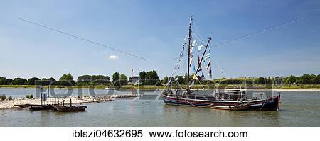 Hasselter Aak landmark anchoring in the Rhine, Monheim am Rhein, Bergisches Land, North Rhine-Westphalia, Germany, Europe View Large Photo Image Stock Photography - Hasselter Aak landmark anchoring in the Rhine, Monheim am Rhein, Bergisches Land, North Rhine-Westphalia, Germany, Europe. Fotosearch