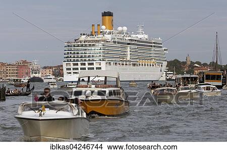 Heavy boat traffic with cruise ship in the lagoon in front of San Marco, Venice, Veneto, Italy, Europe View Large Photo Image Picture - Heavy boat traffic with cruise ship in the lagoon in front of San Marco, Venice, Veneto, Italy, Europe. Fotosearch