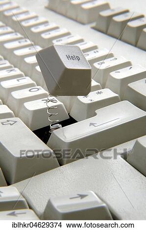 Help key jumps out of the keyboard View Large Photo Image Picture - Help key jumps out of the keyboard. Fotosearch