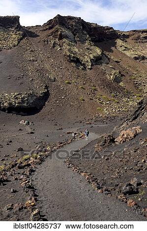 Hiking trail through volcanic landscape, Montana del Cuervo, Lanzarote, Canary Islands, Spain, Europe View Large Photo Image Stock Photo - Hiking trail through volcanic landscape, Montana del Cuervo, Lanzarote, Canary Islands, Spain, Europe. Fotosearch