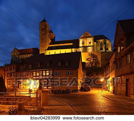 Stock Photo - Historic centre with half-timbered houses at night, castle hill with collegiate church of St. Servatius behind, UNESCO, Quedlinburg, Saxony-Anhalt, Germany, Europe. Fotosearch