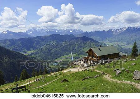 Stock Photography - Hochgernhaus, mountain hut at Hochgern, in the back the Wilder Kaiser, Marquartstein, Oberbayern, Bavaria, Germany, Europe. Fotosearch