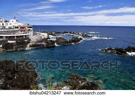 Stock Photo - Holiday complex with natural swimming pool, Porto Moniz, Madeira, Portugal, Europe. Fotosearch
