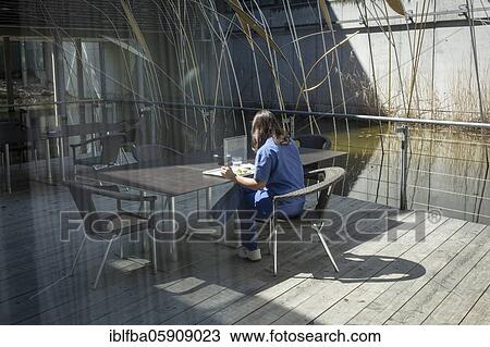 Hospital employee in the canteen during her lunch break, Agatharied Hospital, Agatharied, Bavaria, Germany, Europe View Large Photo Image Stock Image - Hospital employee in the canteen during her lunch break, Agatharied Hospital, Agatharied, Bavaria, Germany, Europe. Fotosearch