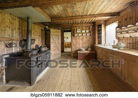Interior view of historical kitchen with old oven, pans, pots, tea maker and old porcelain on peatyard, sod house settlement Grenjadarstadur, Grenjaðarstaður, Þingeyjarsveit, Norðurland eystra, Iceland, Europe View Large Photo Image Stock Image - Interior view of historical kitchen with old oven, pans, pots, tea maker and old porcelain on peatyard, sod house settlement Grenjadarstadur, Grenjaðarstaður, Þingeyjarsveit, Norðurland eystra, Iceland, Europe. Fotosearch