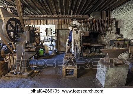 Interior, workshop, old hammer mill at the Ostrach, Obere Hammerschmiede, Bad Oberdorf in Bad Hindelang, Allgau, Bavaria, Germany, Europe View Large Photo Image Stock Photography - Interior, workshop, old hammer mill at the Ostrach, Obere Hammerschmiede, Bad Oberdorf in Bad Hindelang, Allgau, Bavaria, Germany, Europe. Fotosearch