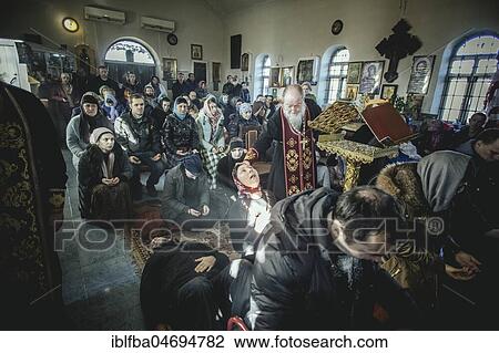 K, Ochamchira, Abkhazia, GeorgiaChurch of Father Sergei during an exorcism. He is widely known as an exorcist and receives people seeking help from all over Russia View Large Photo Image Stock Image - K, Ochamchira, Abkhazia, GeorgiaChurch of Father Sergei during an exorcism. He is widely known as an exorcist and receives people seeking help from all over Russia. Fotosearch