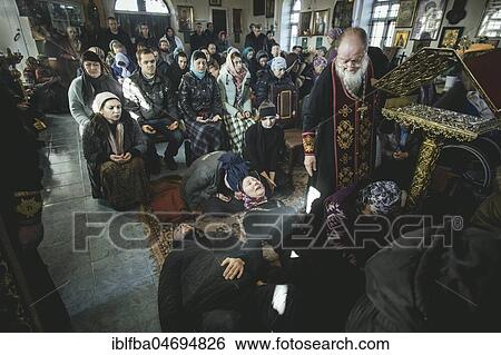 K, Ochamchira, Abkhazia, GeorgiaChurch of Father Sergei during an exorcism. He is widely known as an exorcist and receives people seeking help from all over Russia View Large Photo Image Stock Photograph - K, Ochamchira, Abkhazia, GeorgiaChurch of Father Sergei during an exorcism. He is widely known as an exorcist and receives people seeking help from all over Russia. Fotosearch