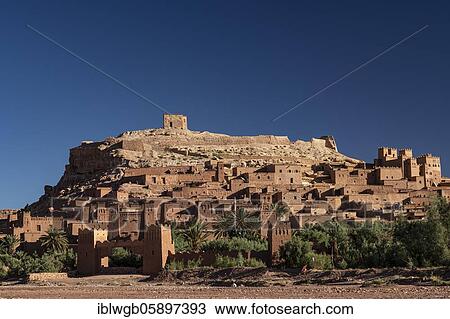 Stock Image - Kasbah Ait Benhaddou, largest Berber fortress, fortified Berber village, Ksar with clay castles, Kasbahs, Tighremt, South Morocco, Morocco, Africa. Fotosearch