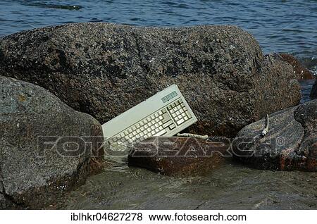 Stock Photo - Keyboard in the water, Berlin, Germany, Europe. Fotosearch