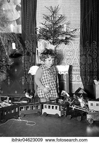 Kind Christmas model railway, ca. 1928, exact location unknown, Germany, Europe View Large Photo Image Stock Photo - Kind Christmas model railway, ca. 1928, exact location unknown, Germany, Europe. Fotosearch