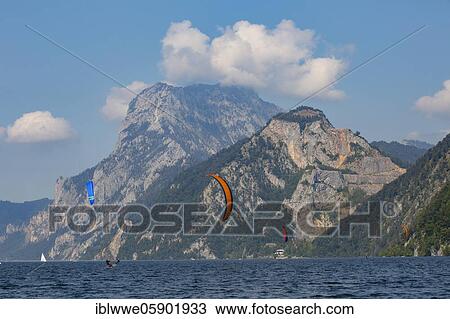 Kitesurfer at Lake Lake Traun with Traunstein, Ebensee, Salzkammergut, Upper Austria, Austria, Europe View Large Photo Image Stock Image - Kitesurfer at Lake Lake Traun with Traunstein, Ebensee, Salzkammergut, Upper Austria, Austria, Europe. Fotosearch