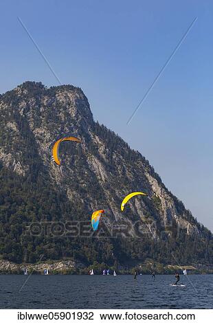Stock Image - Kitesurfer at the Lake Traun with Sonnstein, Ebensee, Salzkammergut, Upper Austria, Austria, Europe. Fotosearch
