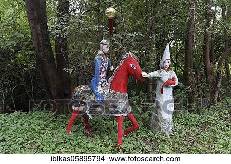 Knight on horseback and woman, fantasy figures, fairy tale figures, sculpture garden of the artist Jochen Bach, Plinzmühle, Plinz, Großkröbitz, Milda, Thuringia, Germany, Europe View Large Photo Image Picture - Knight on horseback and woman, fantasy figures, fairy tale figures, sculpture garden of the artist Jochen Bach, Plinzmühle, Plinz, Großkröbitz, Milda, Thuringia, Germany, Europe. Fotosearch