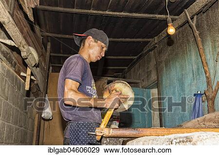 Kyrgyz man preparing the traditional Kyrgyz bread, Kochkor village, Road to Song Kol Lake, Naryn province, Kyrgyzstan, Central Asia, Asia View Large Photo Image Stock Photo - Kyrgyz man preparing the traditional Kyrgyz bread, Kochkor village, Road to Song Kol Lake, Naryn province, Kyrgyzstan, Central Asia, Asia. Fotosearch