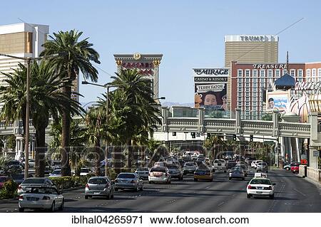 Stock Image - Las Vegas Boulevard South, The Strip, Las Vegas Strip, Caesars Palace Hotel, The Mirage Hotel and Treasure Island Hotel behind, Las Vegas, Nevada, USA, North America. Fotosearch