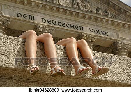 Legs in front of the Reichstag, inscription Dem deutschen Volke, Berlin, Germany, Europe View Large Photo Image Stock Photo - Legs in front of the Reichstag, inscription Dem deutschen Volke, Berlin, Germany, Europe. Fotosearch