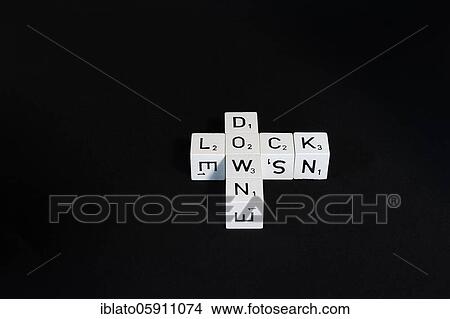 Letter cubes form the word Lockdown, Corona crisis, symbol image, North Rhine-Westphalia, Germany, Europe View Large Photo Image Picture - Letter cubes form the word Lockdown, Corona crisis, symbol image, North Rhine-Westphalia, Germany, Europe. Fotosearch