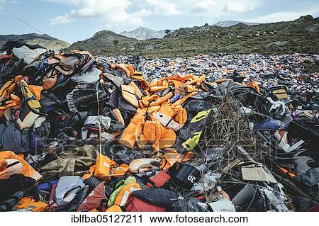 Life jackets at the waste disposal site near Molivos, Lesbos, Greece, Europe View Large Photo Image Stock Image - Life jackets at the waste disposal site near Molivos, Lesbos, Greece, Europe. Fotosearch