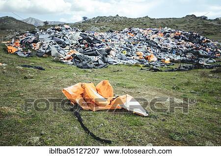 Life jackets at the waste disposal site near Molivos, Lesbos, Greece, Europe View Large Photo Image Stock Photo - Life jackets at the waste disposal site near Molivos, Lesbos, Greece, Europe. Fotosearch