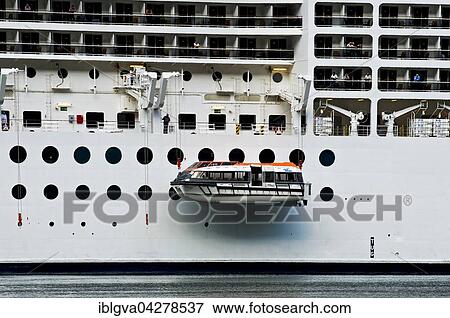 Lifeboats being lowered into the water, emergancy exercise on the cruise ship MSC Poesia, Geiranger, Norway, Europe View Large Photo Image Stock Photo - Lifeboats being lowered into the water, emergancy exercise on the cruise ship MSC Poesia, Geiranger, Norway, Europe. Fotosearch