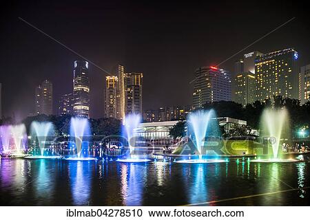 Light show, water fountain, Lake Symphony, city park, skyscrapers, City Centre, Kuala Lumpur, Malaysia, Asia View Large Photo Image Stock Image - Light show, water fountain, Lake Symphony, city park, skyscrapers, City Centre, Kuala Lumpur, Malaysia, Asia. Fotosearch