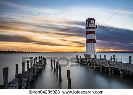 Lighthouse at sunset, Podersdorf am See, Lake Neusiedl, Burgenland, Austria, Europe View Large Photo Image Stock Photo - Lighthouse at sunset, Podersdorf am See, Lake Neusiedl, Burgenland, Austria, Europe. Fotosearch