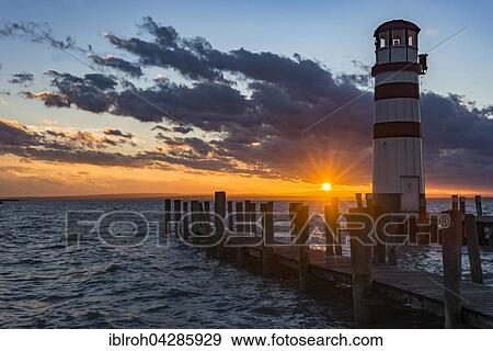 Lighthouse at sunset, Podersdorf am See, Lake Neusiedl, Burgenland, Austria, Europe View Large Photo Image Stock Photo - Lighthouse at sunset, Podersdorf am See, Lake Neusiedl, Burgenland, Austria, Europe. Fotosearch