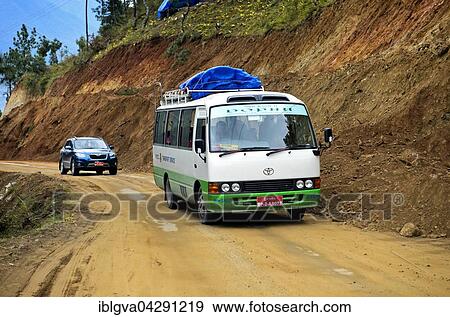 Local bus transportation on the Thimphu Punakha Highway, Bhutan, Asia View Large Photo Image Stock Photo - Local bus transportation on the Thimphu Punakha Highway, Bhutan, Asia. Fotosearch