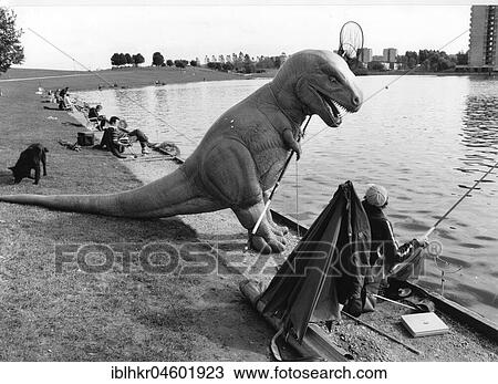 Stock Image - Man and Dino fishing, England, Great Britain. Fotosearch
