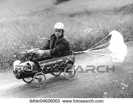 Man in soapbox with brake parachute ca. 1970s, exact place unknown, Czech Republic, Europe View Large Photo Image Stock Image - Man in soapbox with brake parachute ca. 1970s, exact place unknown, Czech Republic, Europe. Fotosearch