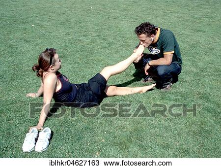 Man kissing woman's feet, Berlin, Germany, Europe View Large Photo Image Stock Image - Man kissing woman's feet, Berlin, Germany, Europe. Fotosearch