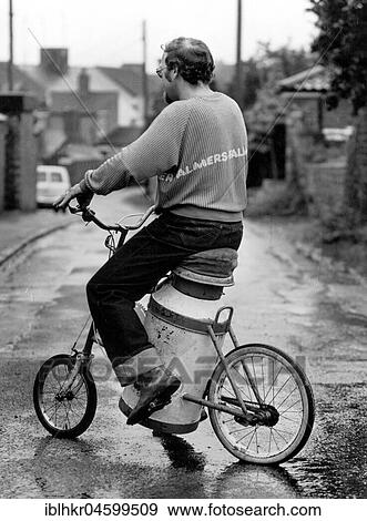 Stock Photo - Man on a curious bicycle, England, Great Britain. Fotosearch
