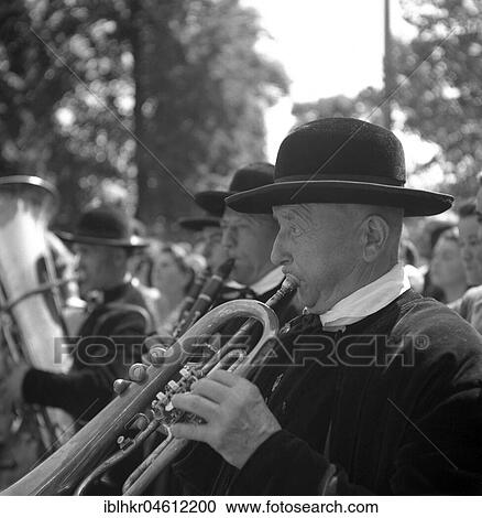 Stock Image - Man playing a trumpet, c. 1945 to 1955, near Freiburg, Germany, Europe. Fotosearch