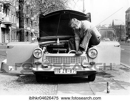 Man repairing Trabbi, ca. 1980s, East Berlin, GDR, Germany, Europe View Large Photo Image Stock Photography - Man repairing Trabbi, ca. 1980s, East Berlin, GDR, Germany, Europe. Fotosearch