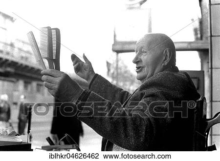 Man with bald head sells combs, ca. 1980s, East Berlin, GDR, Germany, Europe View Large Photo Image Stock Image - Man with bald head sells combs, ca. 1980s, East Berlin, GDR, Germany, Europe. Fotosearch