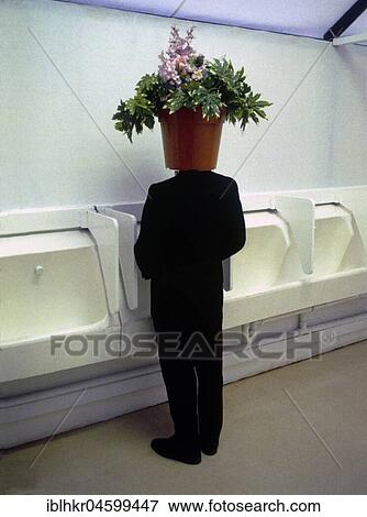 Man with flowerpot on his head in the toilet, England, Great Britain View Large Photo Image Stock Photo - Man with flowerpot on his head in the toilet, England, Great Britain. Fotosearch
