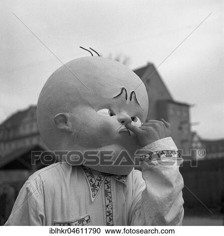 Man with huge baby mask, carnival, around 1950, Freiburg, Germany, Europe View Large Photo Image Stock Image - Man with huge baby mask, carnival, around 1950, Freiburg, Germany, Europe. Fotosearch