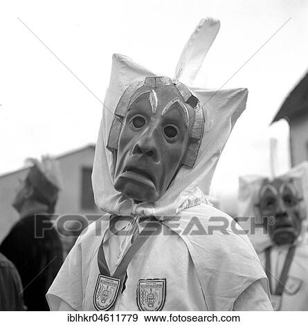 Man with sad looking mask, carnival, around 1950, near Freiburg, Germany, Europe View Large Photo Image Stock Photo - Man with sad looking mask, carnival, around 1950, near Freiburg, Germany, Europe. Fotosearch