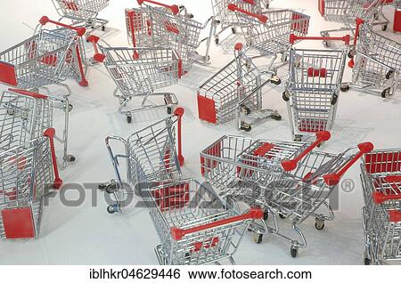 Stock Photograph - Many shopping carts, consumption. Fotosearch