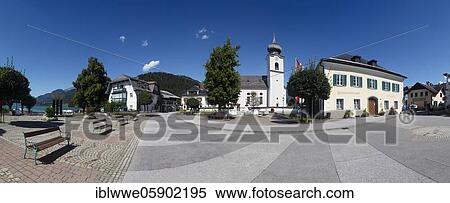 Stock Photography - Market place with parish church Sankt Sigismund, Strobl am Wolfgangsee, Salzkammergut, province of Salzburg, Austria, Europe. Fotosearch