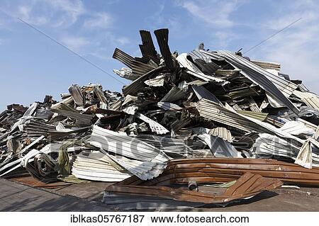 Metal scrap, bent corrugated sheet metal from an industrial hall, demolition, Duisburg, North Rhine-Westphalia, Germany, Europe View Large Photo Image Stock Photo - Metal scrap, bent corrugated sheet metal from an industrial hall, demolition, Duisburg, North Rhine-Westphalia, Germany, Europe. Fotosearch
