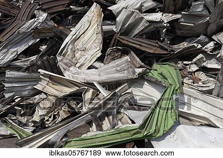 Metal scrap, bent corrugated sheet metal from an industrial hall, demolition, Duisburg, North Rhine-Westphalia, Germany, Europe View Large Photo Image Stock Photo - Metal scrap, bent corrugated sheet metal from an industrial hall, demolition, Duisburg, North Rhine-Westphalia, Germany, Europe. Fotosearch
