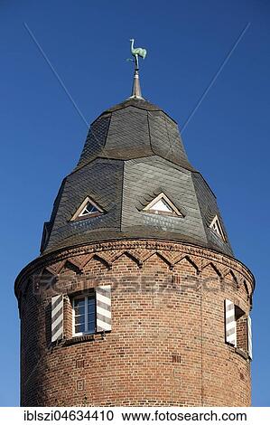 Mill tower with crane, the heraldic animal of Kranenburg, Lower Rhine, North Rhine-Westphalia, Germany, Europe View Large Photo Image Stock Image - Mill tower with crane, the heraldic animal of Kranenburg, Lower Rhine, North Rhine-Westphalia, Germany, Europe. Fotosearch