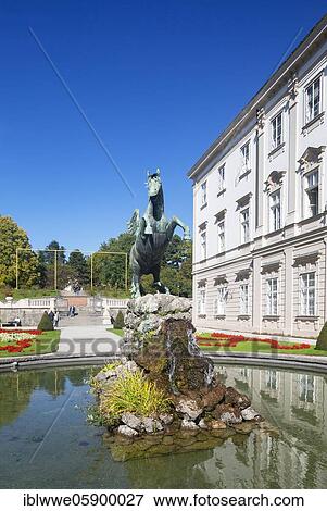 Stock Photo - Mirabell Garden, Pegasus Fountain with Mirabell Palace, Salzburg, Austria, Europe. Fotosearch