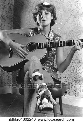 Mouse and guitar player, England, Great Britain View Large Photo Image Stock Image - Mouse and guitar player, England, Great Britain. Fotosearch