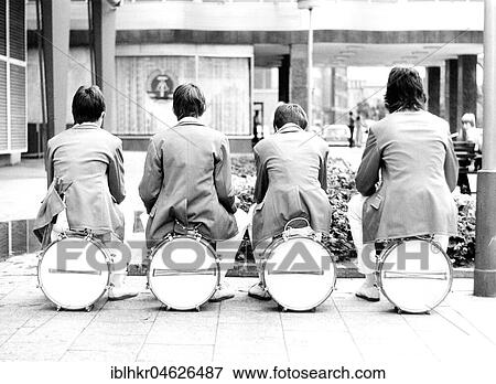 Musicians sit on their instruments, ca. 1980s, East Berlin, GDR, Germany, Europe View Large Photo Image Stock Photo - Musicians sit on their instruments, ca. 1980s, East Berlin, GDR, Germany, Europe. Fotosearch