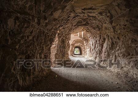 Narrow tunnel through rock, road, Potosi, Bolivia, South America View Large Photo Image Stock Image - Narrow tunnel through rock, road, Potosi, Bolivia, South America. Fotosearch