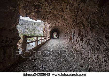 Narrow tunnel through rock, road, Potosi, Bolivia, South America View Large Photo Image Stock Photo - Narrow tunnel through rock, road, Potosi, Bolivia, South America. Fotosearch