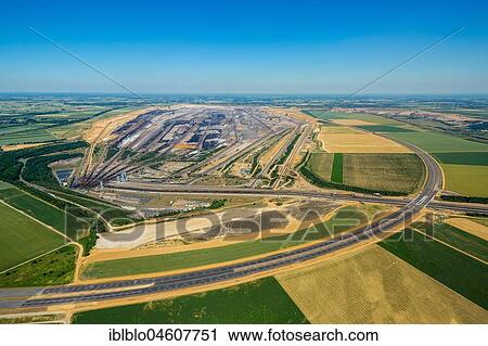 New construction of the A44 and A61 motorways, Jackerath motorway intersection, Garzweiler lignite open-cast mine, RWE-Power, Rheinische Braunkohlerevier, Borschemich, Titz, Lower Rhine, brown coal district, North Rhine-Westphalia, Germany, Europe View Large Photo Image Stock Image - New construction of the A44 and A61 motorways, Jackerath motorway intersection, Garzweiler lignite open-cast mine, RWE-Power, Rheinische Braunkohlerevier, Borschemich, Titz, Lower Rhine, brown coal district, North Rhine-Westphalia, Germany, Europe. Fotosearch